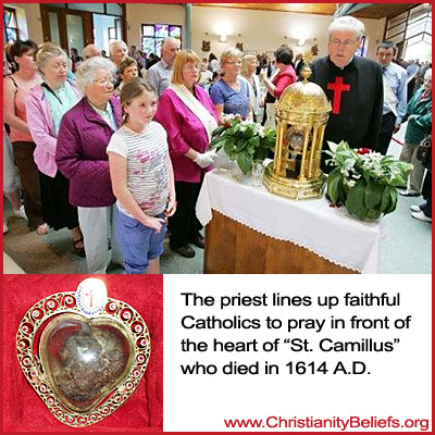 The priest lins up faithful Catholics to pray to the heart of St. Camillus