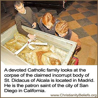 A Catholic family looks over the corpse of St. Didacus of Alcala in Madrid, patron saint of the city of San Diego