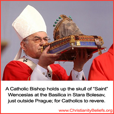 Catholic Bishop holds up the skull of Saint Wenceslas