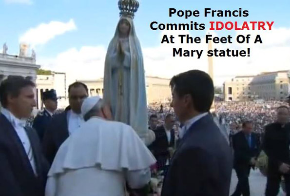 Pope Francis kissing the feet of the Blessed Virgin Mary in St. Peter's Square